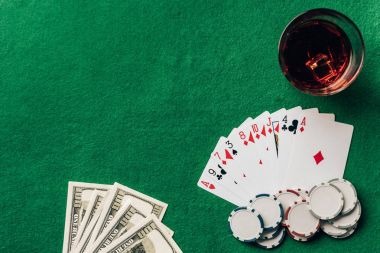 Live Baccarat dealer table with shoe and cards visible